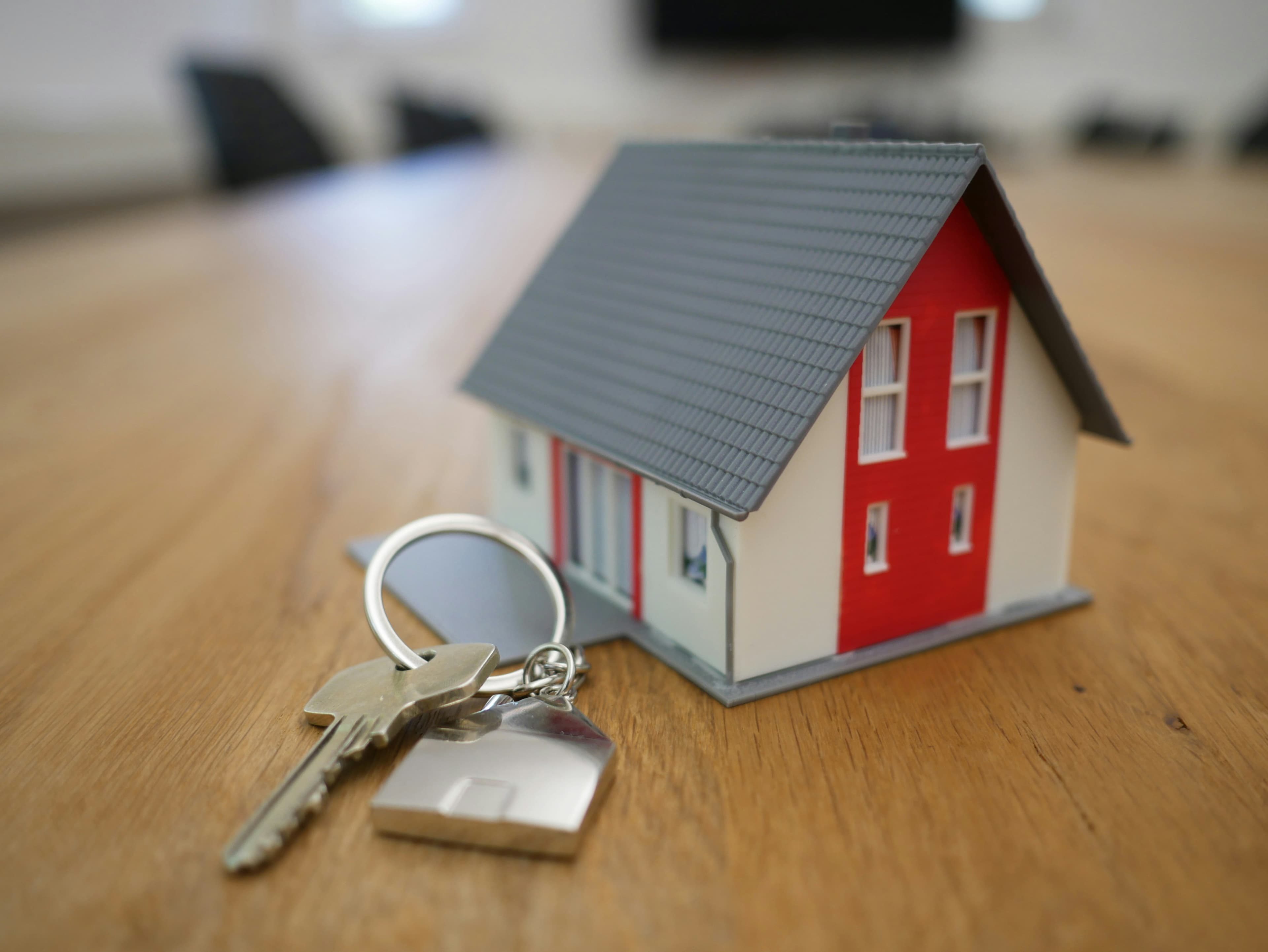 Professional mortgage broker reviewing documents with client